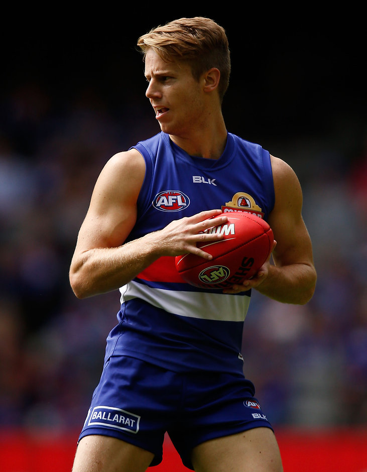 AFL 2016 Rd 01 - Western Bulldogs v Fremantle MELBOURNE, AUSTRALIA - MARCH 27: Lachie Hunter of the Bulldogs in action during the 2016 AFL Round 01 match between the Western Bulldogs and the Fremantle Dockers at Etihad Stadium, Melbourne on March 27, 2016. (Photo by Michael Willson/AFL Media)
